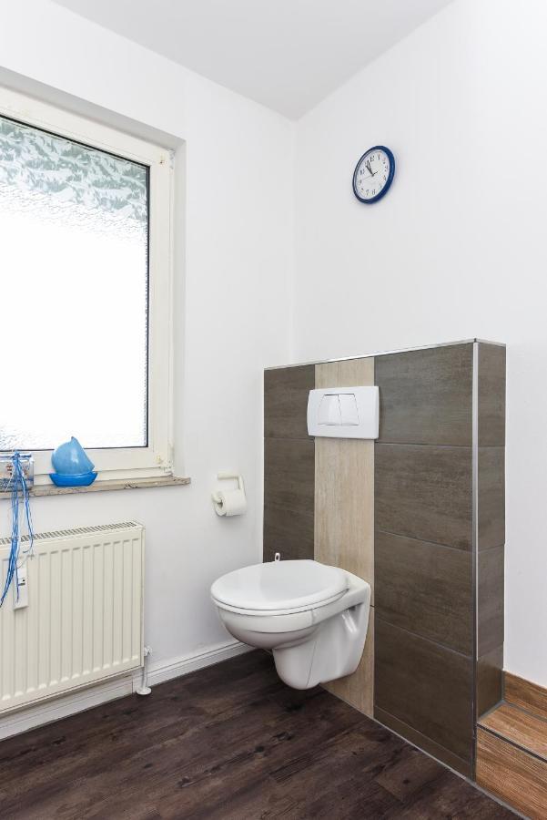 Ferienwohnung Haus Heimathafen เอเซินส์ ภายนอก รูปภาพ